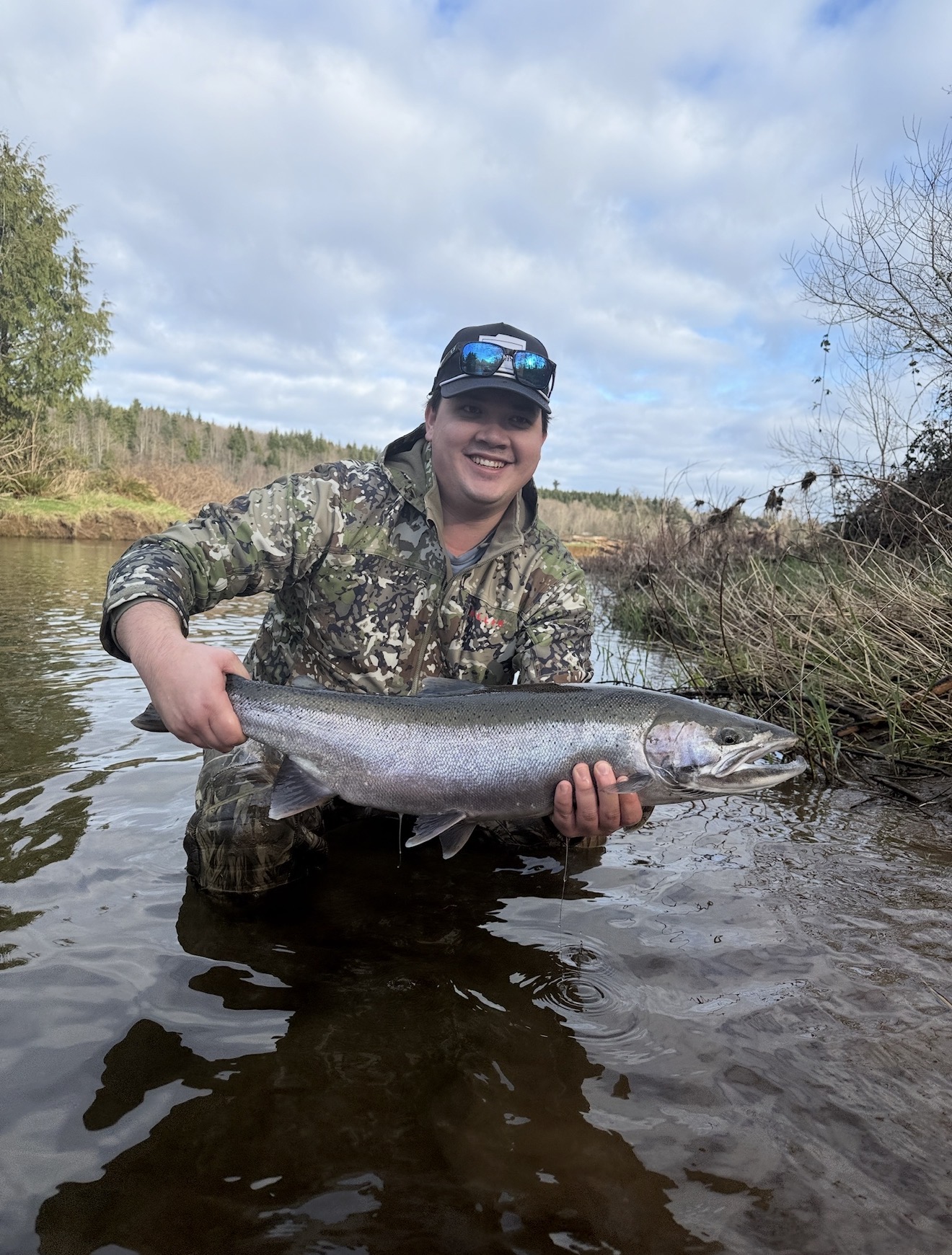 Client with a bright Oregon coastal steelhead